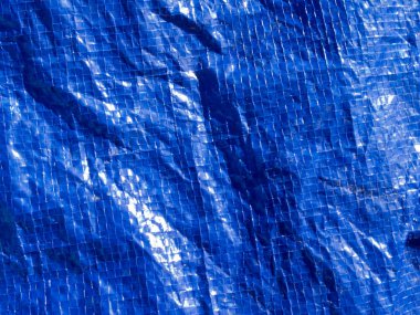 Mavi dokuma plastik muşamba arka plan doku deseninin