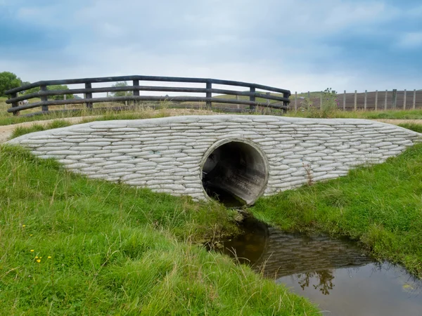 Storm culvert drainage pipe concrete revetment — Stock Photo, Image