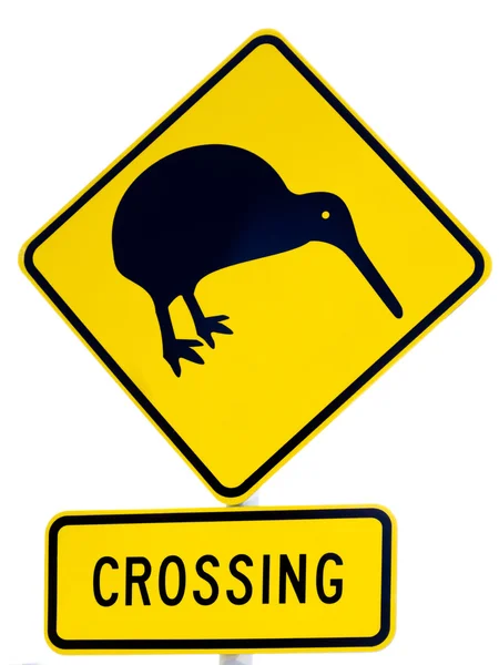 NZ uppmärksamhet kiwi passera vägskylt vit — Stockfoto