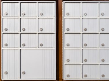 Locker rows of rural Canada Post metal mail box clipart