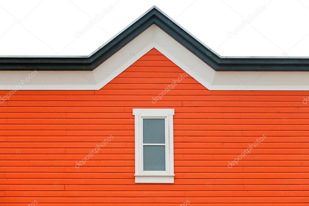 Exterior wall orange siding window and roof trim