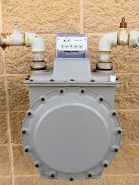 Outside wall natural gas meter supply plumbing clipart
