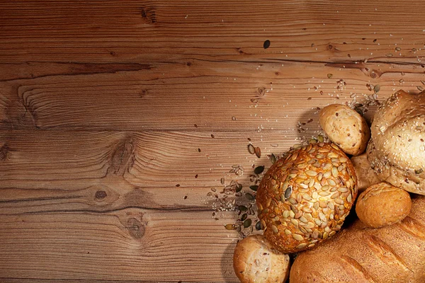 White bread over wooden background — Stock Photo, Image