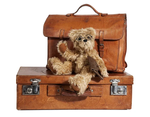 Goed reisde vintage koffer en teddy bear Rechtenvrije Stockafbeeldingen