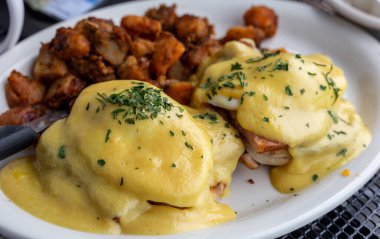 close up view of delicious eggs benedict