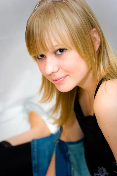 Young girl with a toy bear — Stock Photo, Image