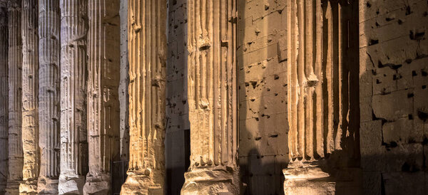 Rome, Italy. Detail of illuminated column architecture of Pantheon by night. Useful as archaeology background.