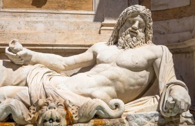 ROME, ITALY - CIRCA AUGUST 2020: famous Greek sculpture of Ocean god, named Marforio. Classic mythology in art. clipart