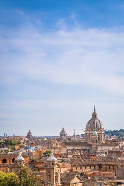 ROME, ITALY- CIRCA AUGUST 2020: panoramic cityscape with blue sky and clouds