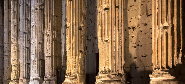 Rome, Italy. Detail of illuminated column architecture of Pantheon by night. Useful as archaeology background.