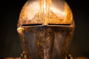 Antique armour on black background. Concept for security, safety and fantasy