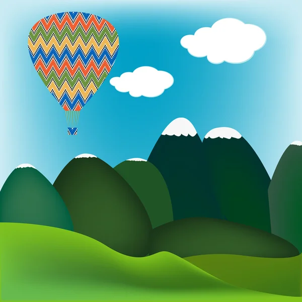 Balão de ar quente sobre uma paisagem montanhosa — Fotografia de Stock