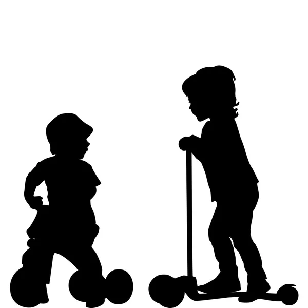 Çocuklar üç tekerlekli bisiklet ve scooter — Stok fotoğraf