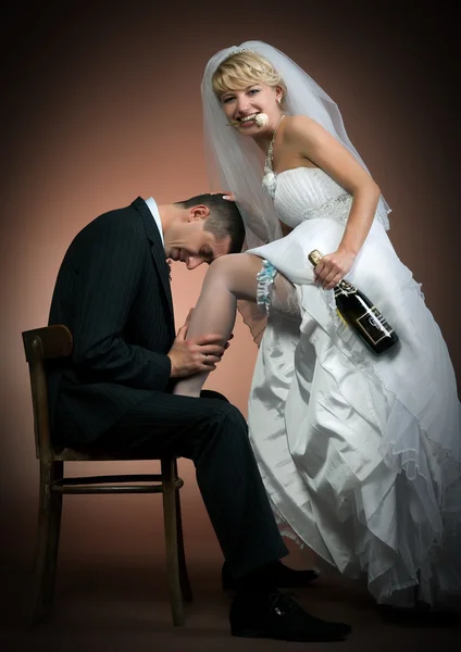 Newly married couple on dark background — Stock Photo, Image