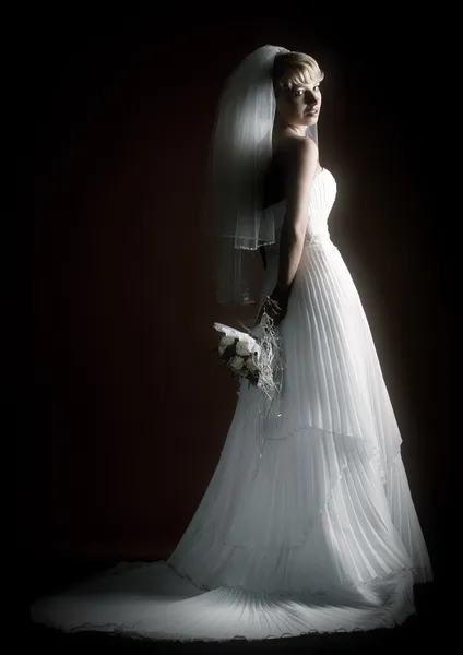 Beautiful bride on dark background — Stock Photo, Image