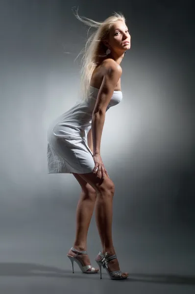 Blond girl in white dress — Stock Photo, Image