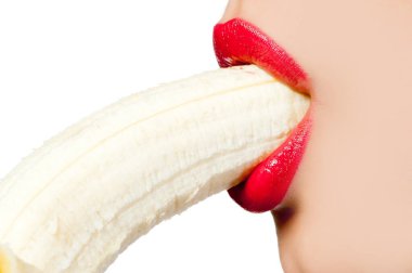 Fgagment female face with a banana close up