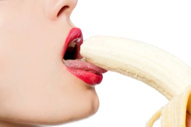 Fgagment female face with a banana close up