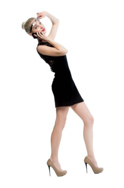 Beautiful sexy blonde woman with telephone isolated on white background