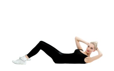 Beautiful sexy blonde woman plays sports on a white background isolated