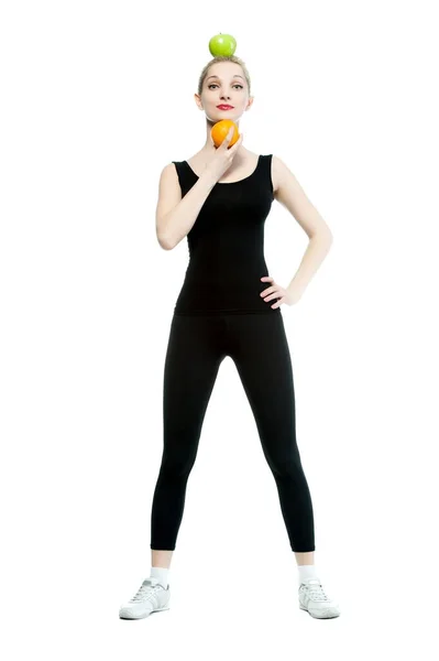 Beautiful Sexy Blond Woman Sportswear Orange Apple White Background Isolated — Stockfoto
