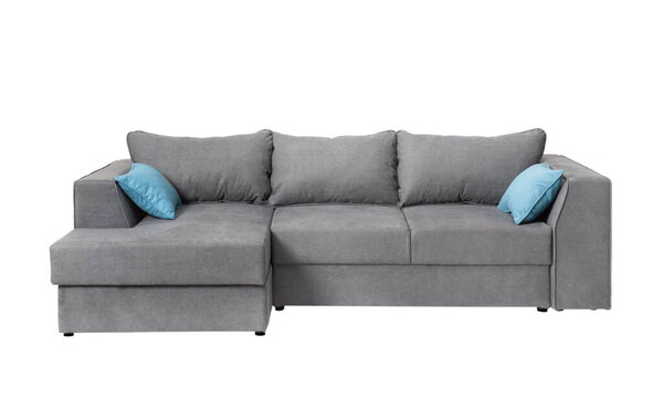 Large gray sofa with two blue pillows, on a white background, isolated