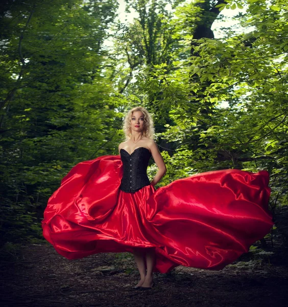 Beautiful Sexy Blonde Girl Black Corset Red Skirt Long Train — Stock Photo, Image