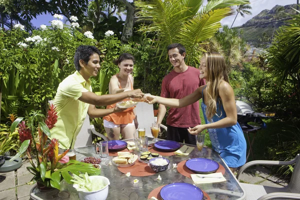 Friends having a barbecue party — Stock Photo, Image