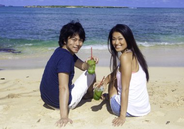 japanese couple at the beach clipart