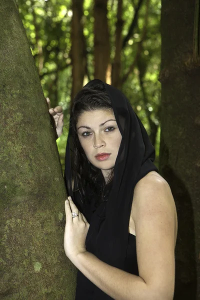 Girl alone in the forest — Stock Photo, Image