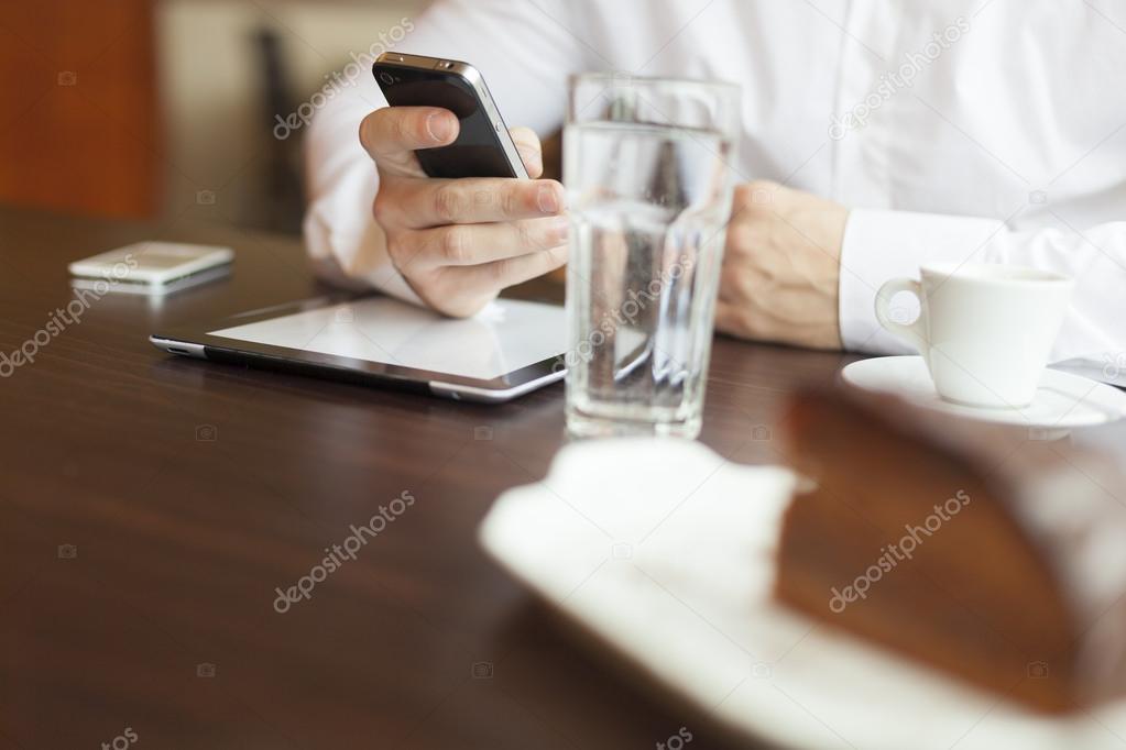Businessman on coffee break in restorant