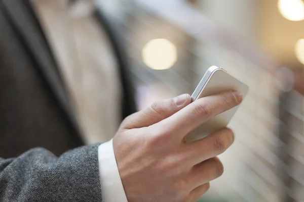 Smartphone - mobile cell phone in hand — Stock Photo, Image