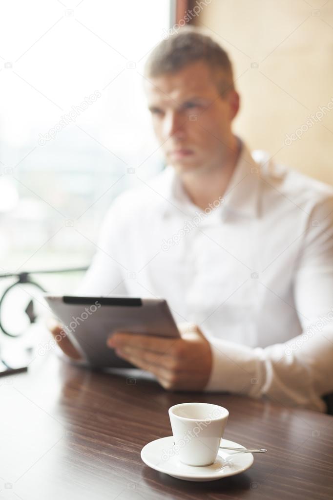 Businessman on Coffee break in restorant