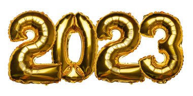 2023 concept Happy New Year from golden foil balloon on yellow background