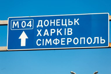 Dnepropetrovsk, Ukraine - February 7, 2016: A road sign with the words: Dpmecl, Harkiv, Simferopo