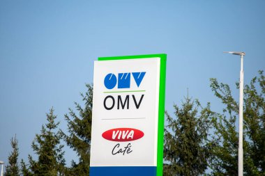 Jagodina, Serbia - July 29, 2022: Logo and sign of OMV on gas station. OMV is a Hungarian-owned oil company operating in Serbia