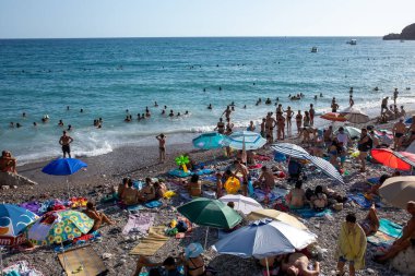 Sutomore, Montenegro - July 15, 2021: Crowd on the beach, famous cheap touristic city Sutomore, Montenegro