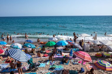 Sutomore, Montenegro - July 15, 2021: Crowd on the beach, famous cheap touristic city Sutomore, Montenegro