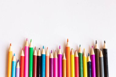 Colorful Wooden Crayons on white background stock photo