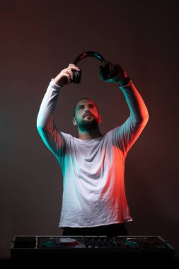 DJ With Headphones For Popular Music Event Party stock photo