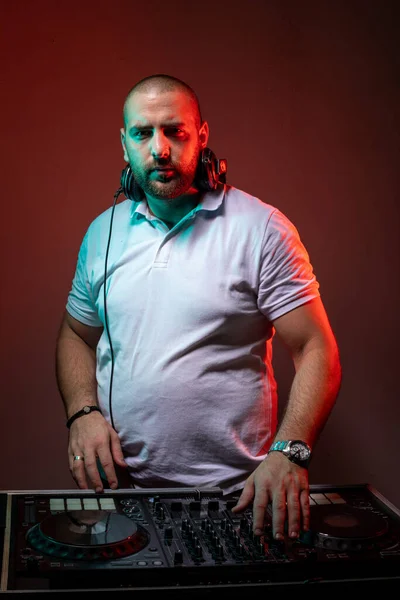 DJ With Headphones For Popular Music Event Party stock photo