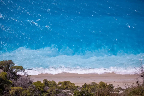 Amazing sea water color and sand beach, blue water and sand backgorund, Lefkada
