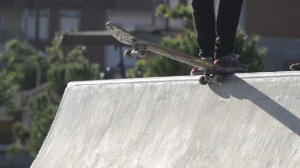 Skateboarders dropping a ramp — Stock Video