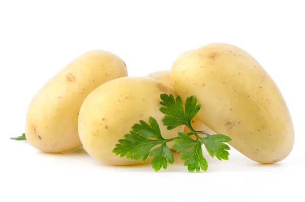 Patatas nuevas y perejil verde —  Fotos de Stock