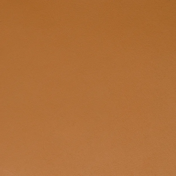 Oranje lederen textuur close-up — Stockfoto