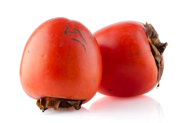 Red ripe persimmons — Stock Photo, Image