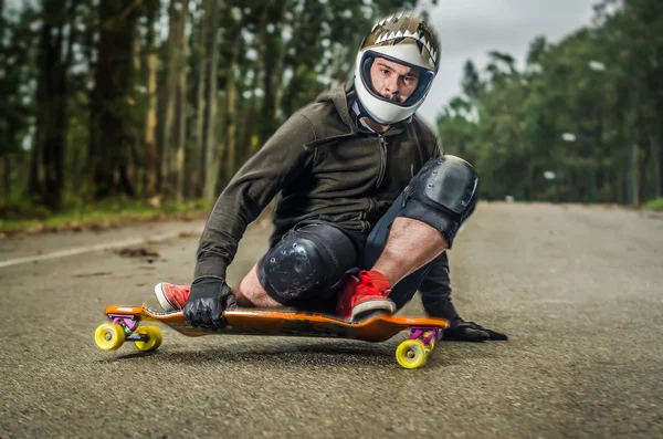 Downhill skateboarder in action — Stock Photo, Image