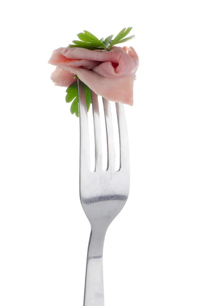 Slice of ham skewered on a fork — Stock Photo, Image