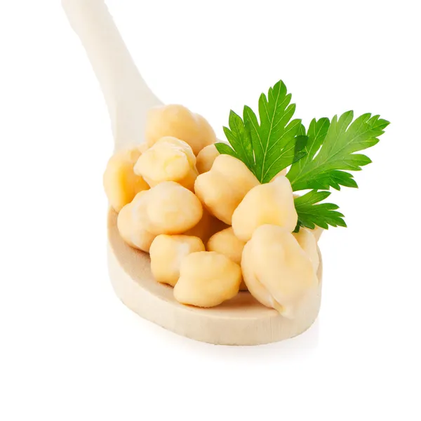 Chickpeas over spoon — Stock Photo, Image