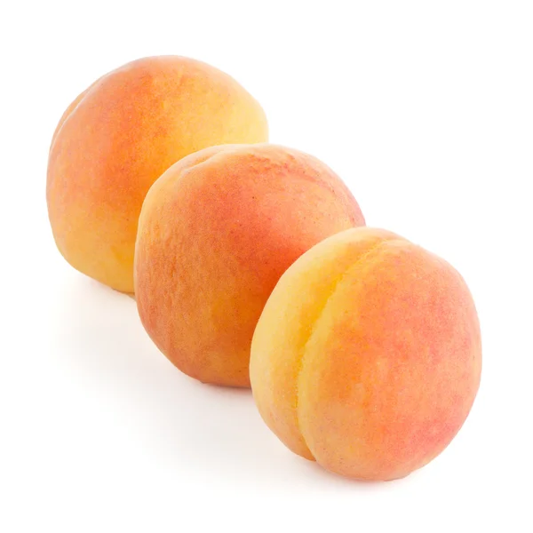 Three sweet peaches — Stock Photo, Image